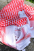 Authentic red and white Keffiyeh scarf adorned with classic tassels. Woven by skilled artisans, this scarf reflects the rich heritage of Middle Eastern craftsmanship.
